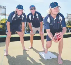  ?? Picture: MIKE DUGDALE ?? Barwon Rockets had a team bonding session at Belmont Bowls Club. Vice captain Logan Taylor and coach Bryan Thomas keep an eye on captain Sam Allen’s style.