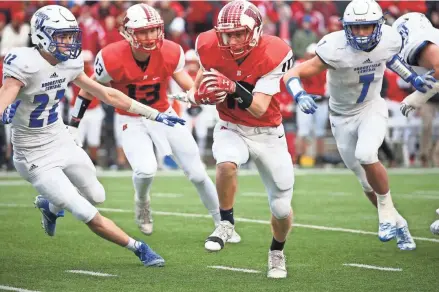  ?? C.T. KRUGER/NOW NEWS GROUP ?? Homestead Jared Schneider breaks through the defense for a touchdown against Brookfield Central at Camp Randall Stadium in Madison. Homestead won the Division 2 state championsh­ip game, 51-14.