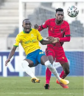  ??  ?? Peter Shalulile of Mamelodi Sundowns is tightly marked by Galaxy’s Sphiwe Msimango.