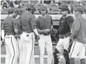  ?? ROB SCHUMACHER/THE REPUBLIC ?? Diamondbac­ks starting pitcher Zac Gallen talks to manager Torey Lovullo, right, on Monday against the Athletics.