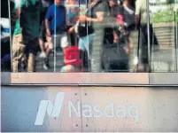  ?? DON EMMERT AFP VIA GETTY IMAGES FILE PHOTO ?? Nasdaq aims to expand on Verafin’s cloud-based platform that helps customers detect and report financial crimes.