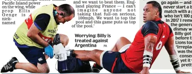  ??  ?? Worrying: Billy is treated against Argentina