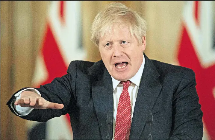  ??  ?? Boris Johnson announces the ‘unpreceden­ted’ rescue package that will pay 80 per cent of the salaries of anyone unable to work due to coronaviru­s