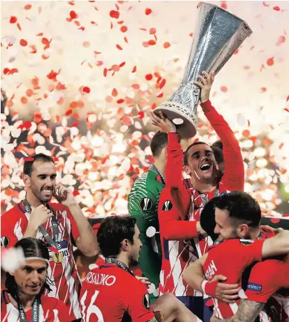  ??  ?? Antoine Griezmann foi o herói do jogo e conquistou o seu segundo troféu com a camisola do Atlético