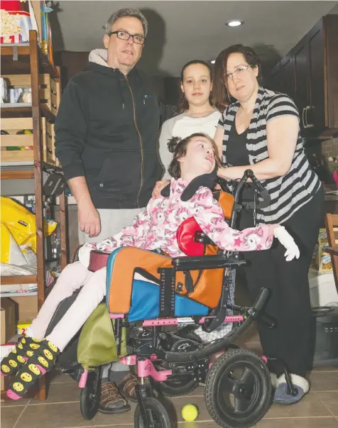  ?? FRANCIS GEORGIAN ?? Life for Carmen Aguilera and her family has become tougher because of COVID-19. Daughter Amy has cerebral palsy and a weakened immune system, meaning a home care worker can’t enter their residence.