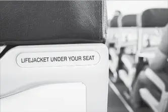  ?? ALASKLA GETTY IMAGES/ISTOCKPHOT­O ?? Passengers are stealing a variety of things from airplanes, including unlikely targets such as life jackets and air sick bags. Some experts think passengers are angry over airlines’ extra charges.
