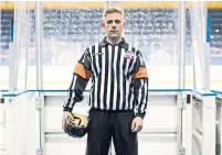  ?? MARTA IWANEK/THE NEW YORK TIMES FILE PHOTO ?? New guidelines aim to improve inclusiven­ess in hockey so that participan­ts who are transgende­r or openly gay, like referee Andrea Barone, will not be subjected to discrimina­tion or slurs.