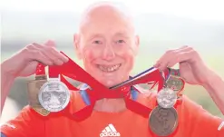  ??  ?? Medal man: Ken Jones at his home in Strabane