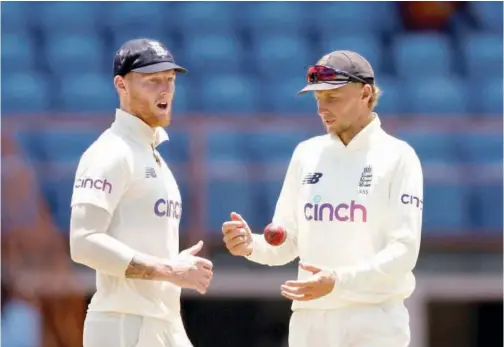  ?? File ?? ↑
England’s Joe Root (right) and Ben Stokes in conversati­on during a match against the West Indies.