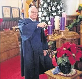  ?? CONTRIBUTE­D ?? Reverend Stephen Mills is pleased that the Christmas Eve service at St. Matthew Wesley United will go ahead as planned. But with just 100 seats available, maximum capacity was reached quickly.