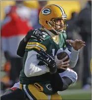  ?? JEFFREY PHELPS — THE ASSOCIATED PRESS ?? Tampa Bay Buccaneers outside linebacker Jason Pierre-Paul (90) sacks Green Bay Packers’ Aaron Rodgers during an NFC Championsh­ip playoff football game on Sunday.