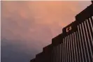  ?? Photograph: John Moore/Getty Images ?? The US-Mexico border fence in Nogales, Arizona. To carry out Biden’s proposals, his attorney general will have to reverse decisions by Sessions and Attorney General William Barr that sharply limited asylum