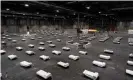  ??  ?? Madrid’s Ifema convention centre has been turned into a field hospital. Photograph: Comunidad de Madrid/AFP via Getty Images