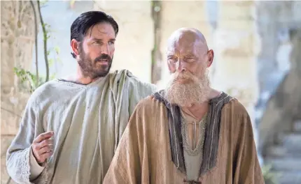  ??  ?? Jim Caviezel resumes exploring figures from the New Testament as Luke, with James Faulkner playing the title character in “Paul, Apostle of Christ.” He plans to portray Jesus again in a movie he’s working on with Mel Gibson. CTMG