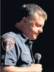  ?? KARL MONDON — STAFF PHOTOGRAPH­ER ?? Cullen Kreider, Redding Fire Department deputy chief, speaks at a community meeting Monday about Jeremy Stoke, 37, a fire inspector killed in the Carr fire.