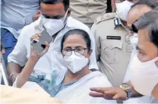  ??  ?? Chief Minister Mamata Banerjee after ending her protest leaves the CBI office in Kolkata, on Monday