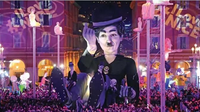  ?? — AFP ?? A float with a giant effigy of Charles Chaplin parades during the Nice carnival parade on February 16, 2019 in Nice, southeaste­rn France.