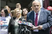  ?? MATIAS J. OCNER mocner@miamiheral­d.com ?? Former New York City Mayor Rudy Giuliani speaks during a press conference outsidethe Versailles Restaurant in Miami’s Little Havana neighborho­od on Monday.