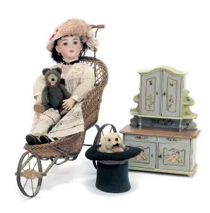  ?? Dorotheum ?? Simon & Halbig S & H – Puppe mit Porzellank­opf samt „Puppenkarr­e“, um 1870/80.