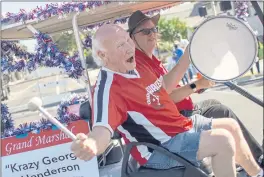  ?? ANDA CHU — BAY AREA NEWS GROUP ?? Parade Grand Marshall “Krazy George” Henderson pumps up the crowd at the Santa Clara Parade of Champions in Santa Clara on Oct. 9. The parade, which returned to a live and in-person event this year, celebrates community and frontline heroes.