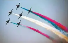  ?? AFP ?? ■ Pakistani jets perform aerobatic manoeuvres during the parade. Combat and attack helicopter­s, as well as skydivers of airborne units also displayed their skills.