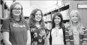  ?? LYNN KUTTER ENTERPRISE-LEADER ?? Brighid Calhoun-Simpson, left, Anna de Leon, Pixie Hickerson and Zoie Jones, sixth-graders at Lynch Middle School in Farmington, were second place state winners in the eCYBERMISS­ION competitio­n.