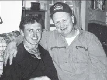  ??  ?? The late Captain Roger Stoddard (left) and Robey Hatfield pose for a photo taken in the 1990s.