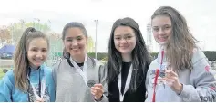  ??  ?? Medal boost Under 15 girls 4x100 silver medal winners Corilidh Cook, Briagha Cook, Mia Glen and Shona McLay