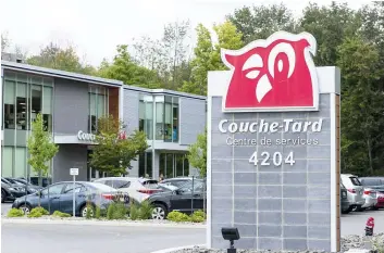  ?? PHOTO D’ARCHIVES, CHANTAL POIRIER ?? Le siège social de Couche-tard, à Laval. L’entreprise québécoise a touché 50 M$ en subvention salariale, en 2020, tout en engrangean­t des profits de 3,7 milliards $.