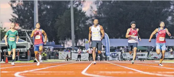  ?? Picture: NMPMG2022/KEN CAMACHO ?? Banuve Tabakaucor­o leads the men’s 100 metres final race during the Pacific Mini Games in Saipan, Northern Marianas on Thursday.