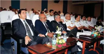  ??  ?? (Top) Chief of the Naval Staff Admiral Sunil Lanba delivering his key note address at the seminar; (middle) The first session of the conference – India as a Resurgent Maritime Power – in progress; (above) Delegates at the seminar.