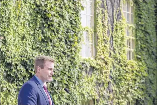  ?? CP PHOTO ?? New Brunswick Liberal Leader Brian Gallant addresses the media after meeting with Lieutenant Governor of New Brunswick Jocelyne Roy-vienneau last month in Fredericto­n.