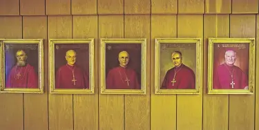  ?? Darren Hauck / ProPublica ?? Paintings of former Milwaukee archbishop­s hang at the archdioces­e’s offices. The majority of U.S. dioceses, as well as dozens of religious orders, have released lists of abusers currently or formerly in their ranks.