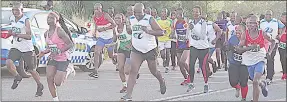  ?? ?? Athletes set off for the 21km of the Lubombo Marathon that started at Mhlumeni and ended at Siteki Sports Ground yesterday.