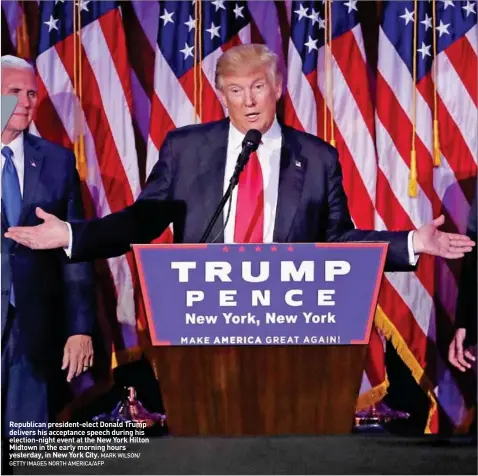  ??  ?? Republican president-elect Donald Trump delivers his acceptance speech during his election-night event at the New York Hilton Midtown in the early morning hours yesterday, in New York City.