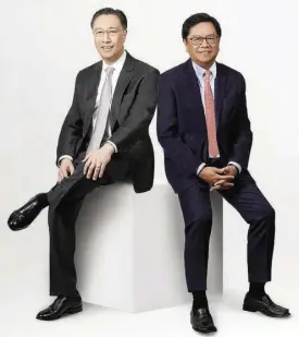  ??  ?? BancNet chairman Nestor Tan and BancNet president Cezar Consing.