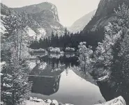  ??  ?? “Mirror Lake,” by Ansel Adams, possibly the bestknown American photograph­er.