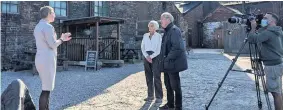  ??  ?? FILMING: Gyles Brandreth and Sheila Hancock talk to Middleport Pottery’s chief executive Clare Wood for Great Canal Journeys.