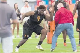  ?? MATIAS J. OCNER/MIAMI HERALD ?? Former Hurricanes defensive tackle Kendrick Norton, above, said sophomore defensive lineman Jon Ford has the potential to be “another great one to come out of Miami.”