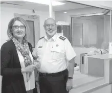  ??  ?? Patricia Mamic, government affairs director for the B.C. Salvation Army, and Maj. Brian Slous of the Victoria Addictions and Rehabilita­tion Centre, which opens its renovated facility this week.