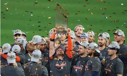  ?? ?? The Houston Astros hoist the World Series trophy. Photograph: Thomas Shea/USA Today Sports