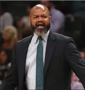  ?? PATRICK SMITH — GETTY IMAGES ?? J.B. Bickerstaf­f won his first game Friday as head coach of the Cleveland Cavaliers, 113-108 over Washington.