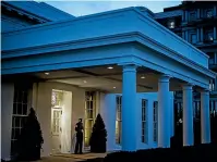  ?? WASHINGTON POST ?? The sun sets over the West Wing at the White House yesterday in Washington.