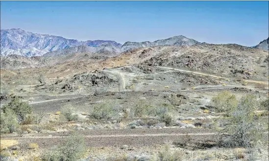  ?? Photograph­s by Irfan Khan Los Angeles Times ?? OFF-ROAD VEHICLE tracks cross the Chuckwalla Bench. A new land-use plan could shrink desert areas protected from off-roading, grazing and energy projects.