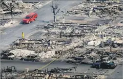  ?? MARCUS YAM LOS ANGELES TIMES ?? A SANTA ROSA mobile-home park leveled by fire. Many wine country residents didn’t receive warnings that they were in the path of wildfires.