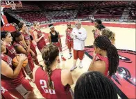  ?? NWA Democrat-Gazette/J.T. WAMPLER ?? First-year Arkansas women’s Coach Mike Neighbors (center) takes over a team that went 13-17 a year ago and has six new players on its 13-player roster.