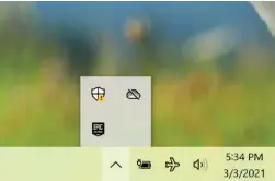  ??  ?? Normally, these taskbar icons are hidden on the Windows 10 Taskbar, and they’re easy to forget about. What we wanted to know was whether the Epic Games Store, even while hidden, was the culprit behind our lower battery life. It was.