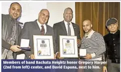  ??  ?? Members of band Bachata Heightz honor Gregory Harper (2nd from left) center, and David Espana, next to him.