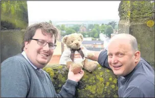  ??  ?? Hinckley and Rugby Building Society is sponsoring the bungee equipment which will keep cuddly toys safe when a teddy bear bungee jump is held from the top of St Mary’s Parish Church in Hinckley on Sunday. Society customer assistant Nate Jones with...