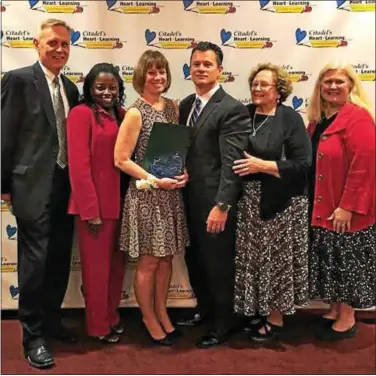  ?? SUBMITTED PHOTO ?? Peirce Middle School social studies teacher Cindy Diffendall, third from left, is the middle school recipient of the 2017 Citadel Heart of Learning Award. From left are: Dr. James Scanlon, West Chester Area School District superinten­dent; Dr. Judy Maxwell, Peirce Middle School assistant principal; Diffendall; Dr. Geoff Mills, Peirce principal; Sue Tiernan, WCASD School Board vice president; and WCASD School Board member Dr. Karen Hermann.